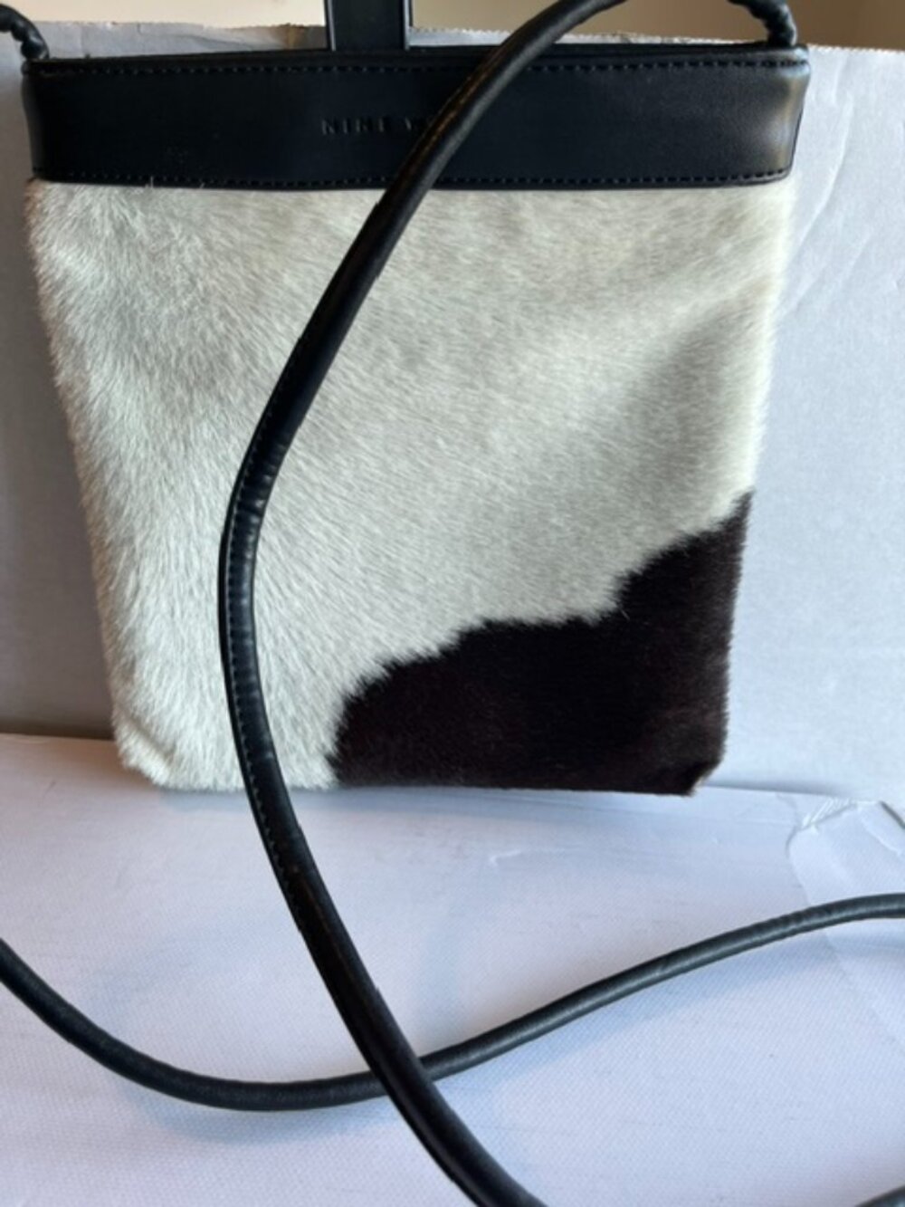 Nine West cowhide and leather crossbody bag.